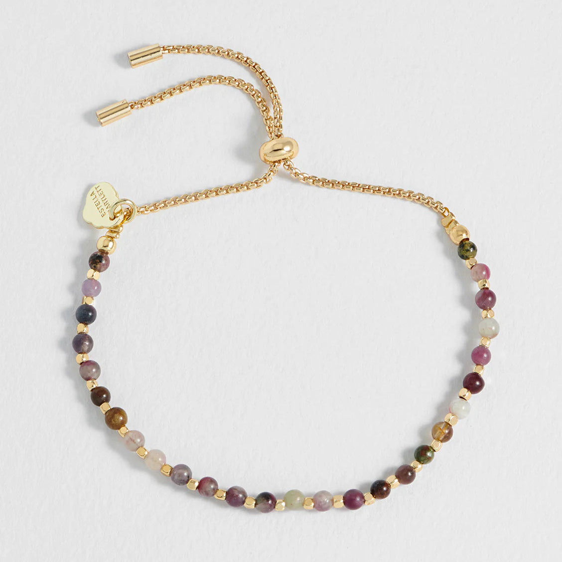 Estella Bartlett Howlite Gemstone Bracelet - Balance with gold accents on a light gray background