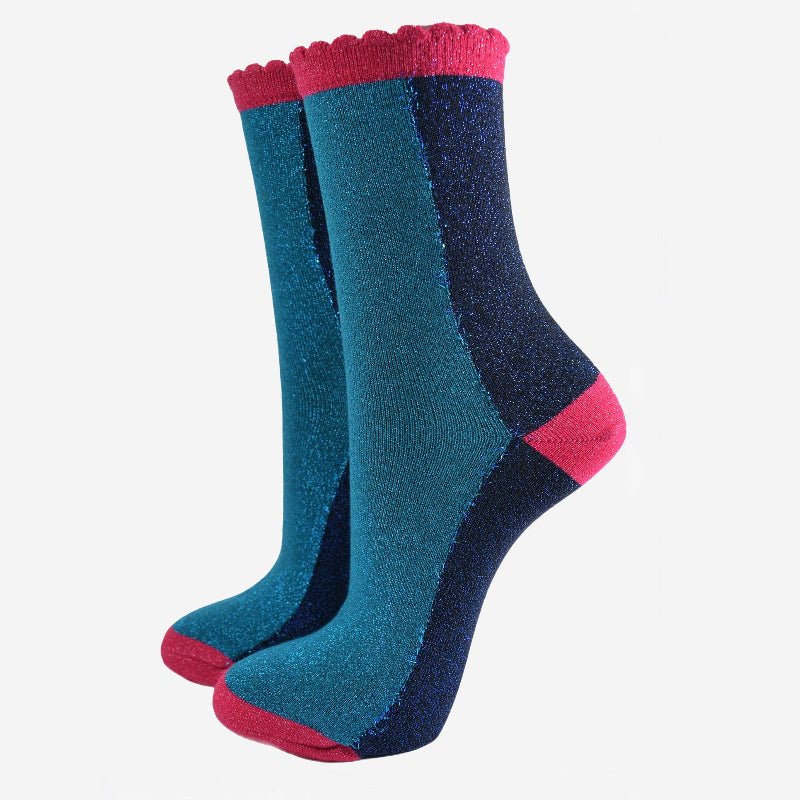 Pair of blue and pink socks on a white background