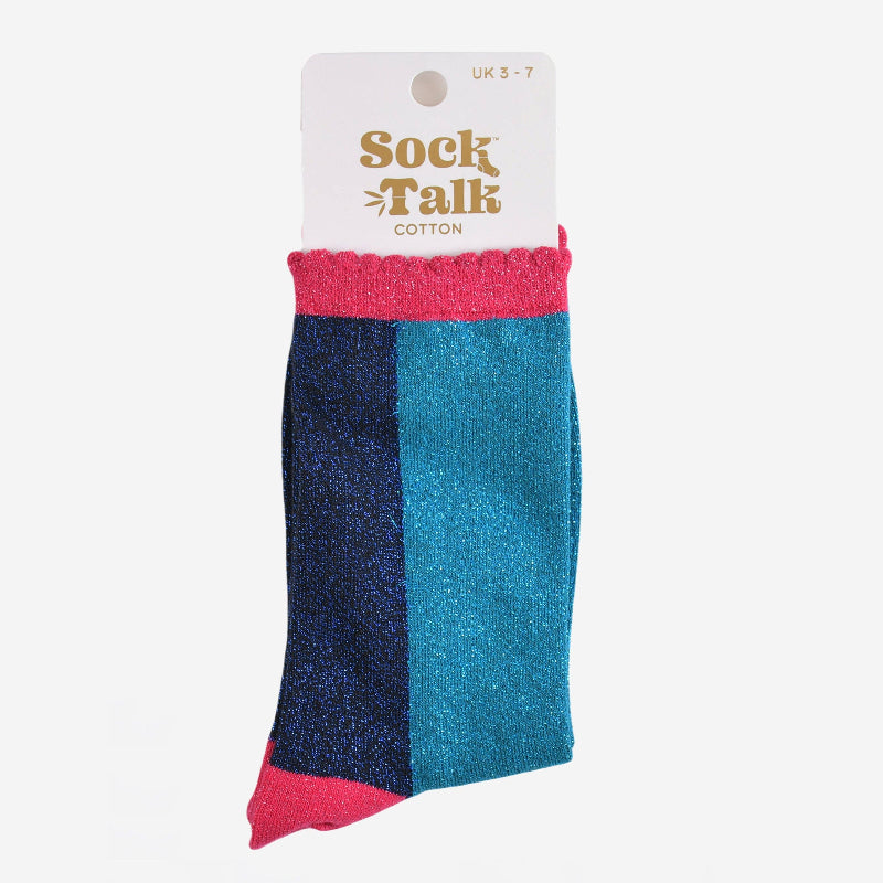 Color-blocked sock with pink and blue design on a white background