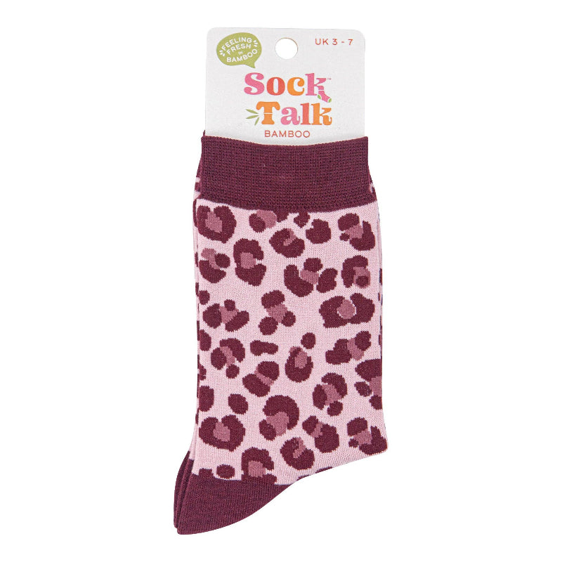Sock with leopard print pattern on a pink background, featuring 'Sock Talk' branding.