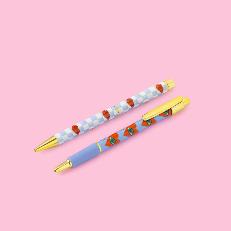 eleanor bowmer Lips & Hearts Pen & Pencil Set - Two pens with decorative designs on a pink background