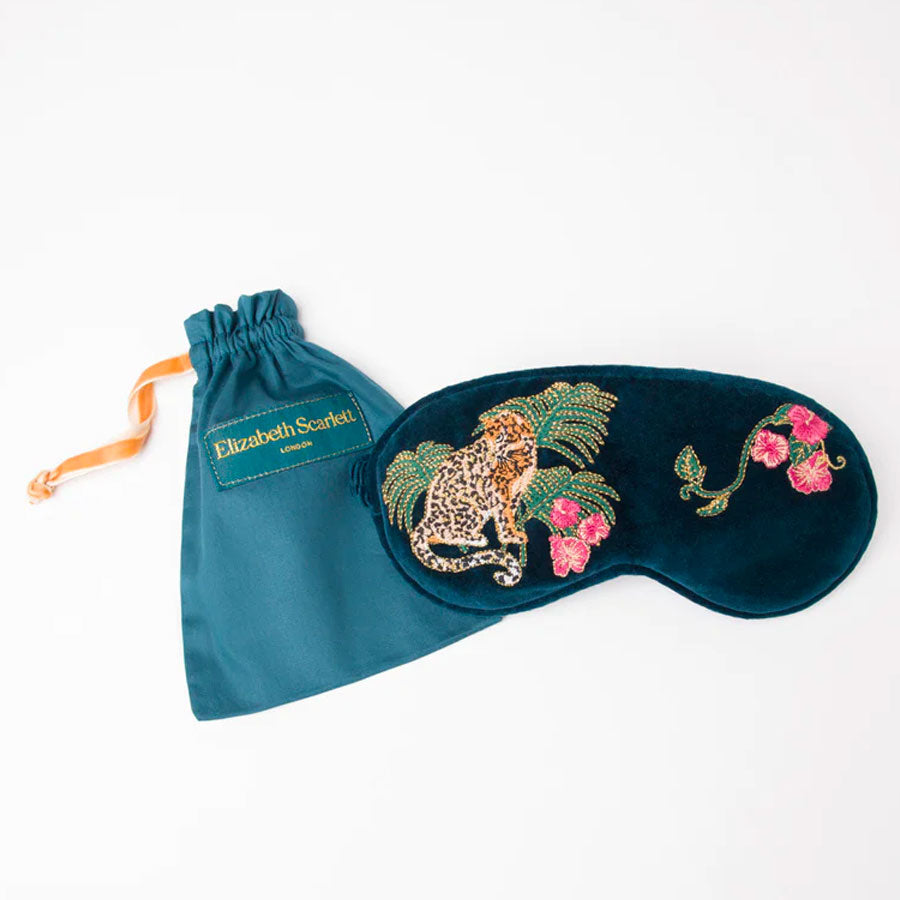 luxury velvet eye mask with embroiderd jungle janguar design.