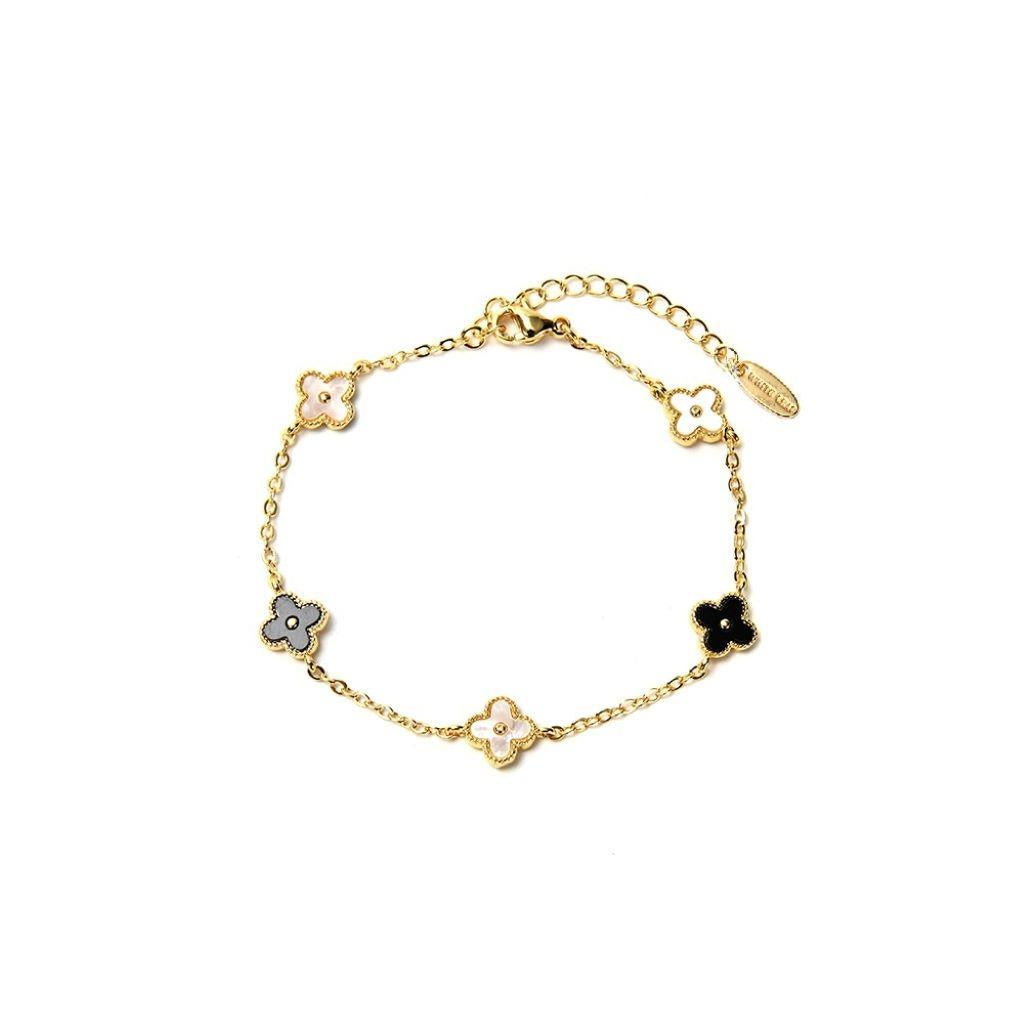 mini clover bracelet with mop and black charms in gold plated steel