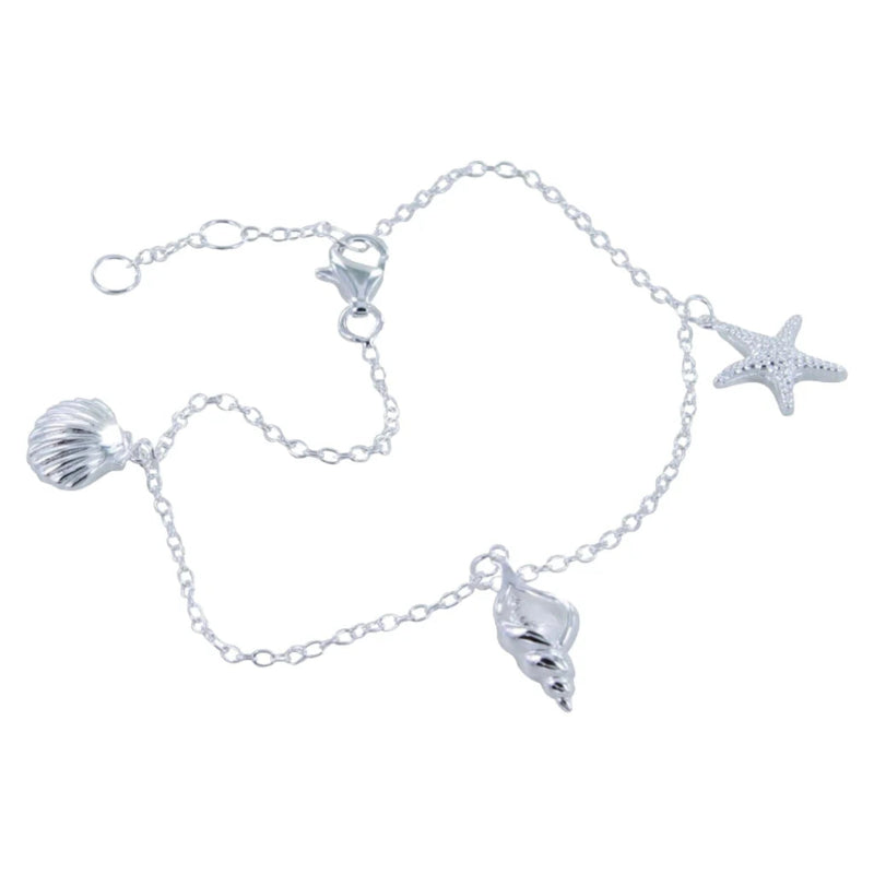 Silver anklet with shell and starfish charms on a white background