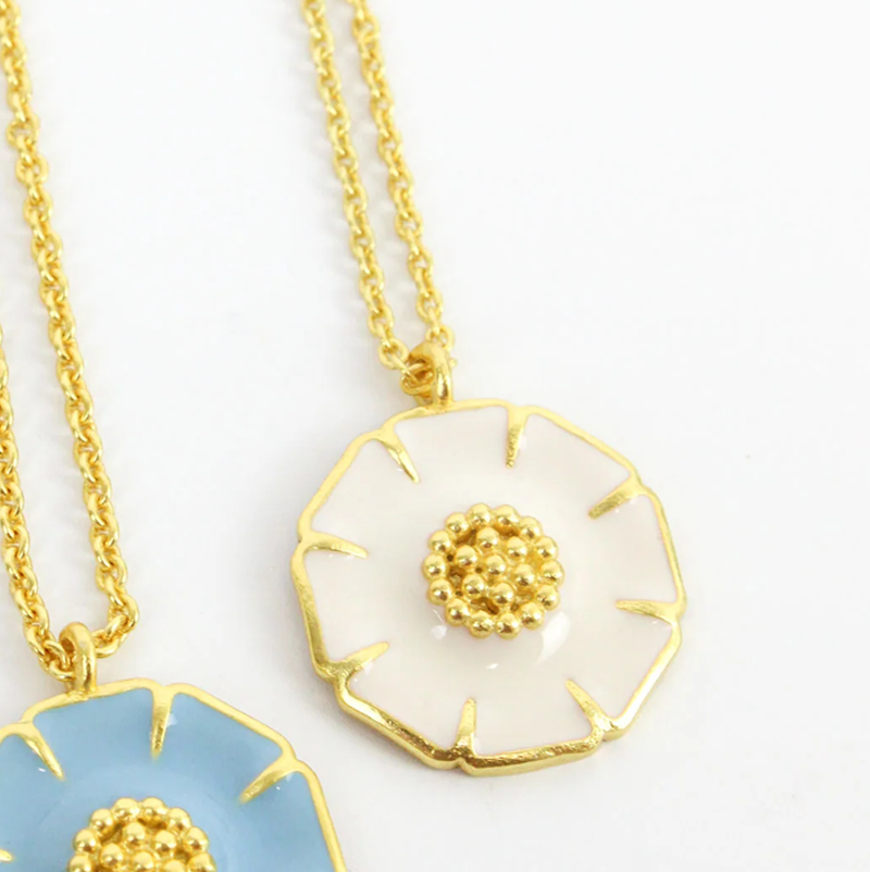 white enamel daisy pendant necklace in gold 