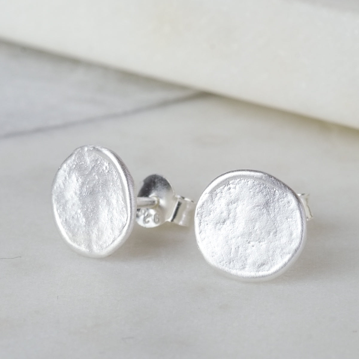 silver round flat studs