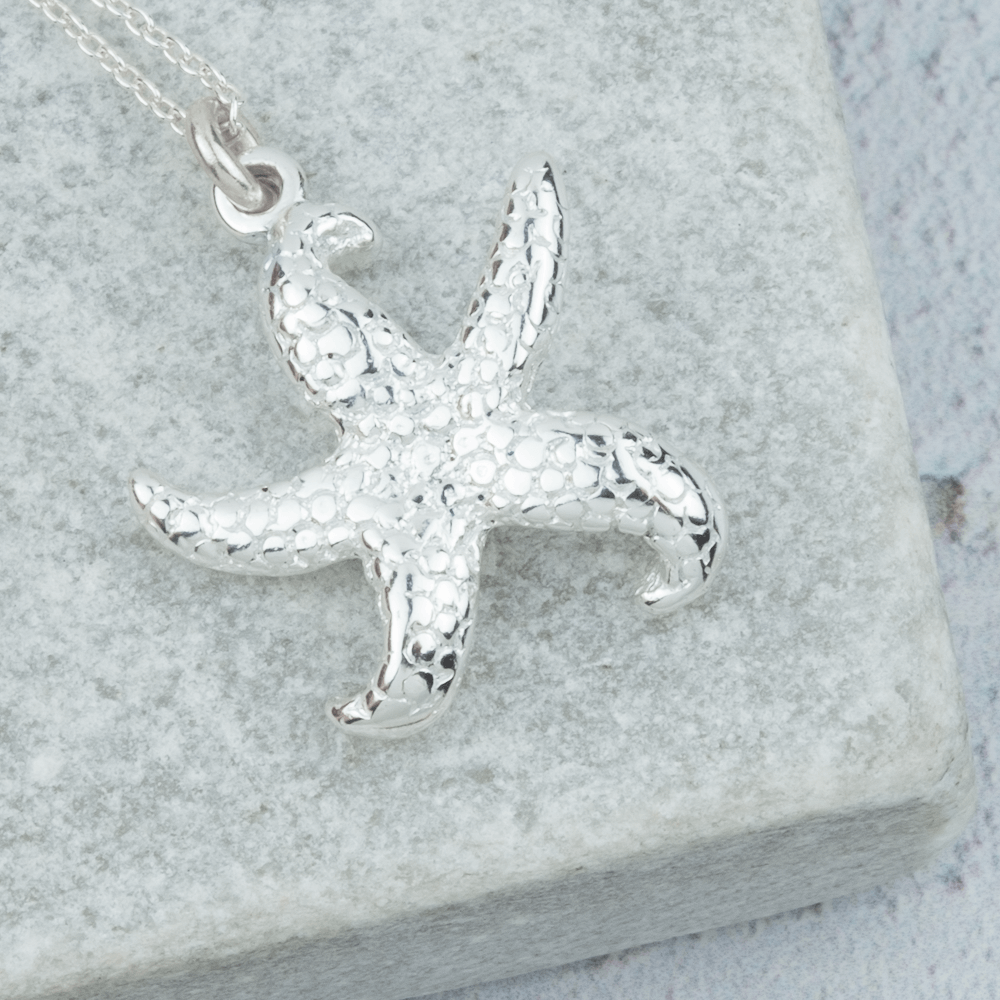 silver starfish necklace detailed