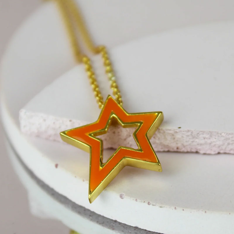 gold star necklace orange enamel