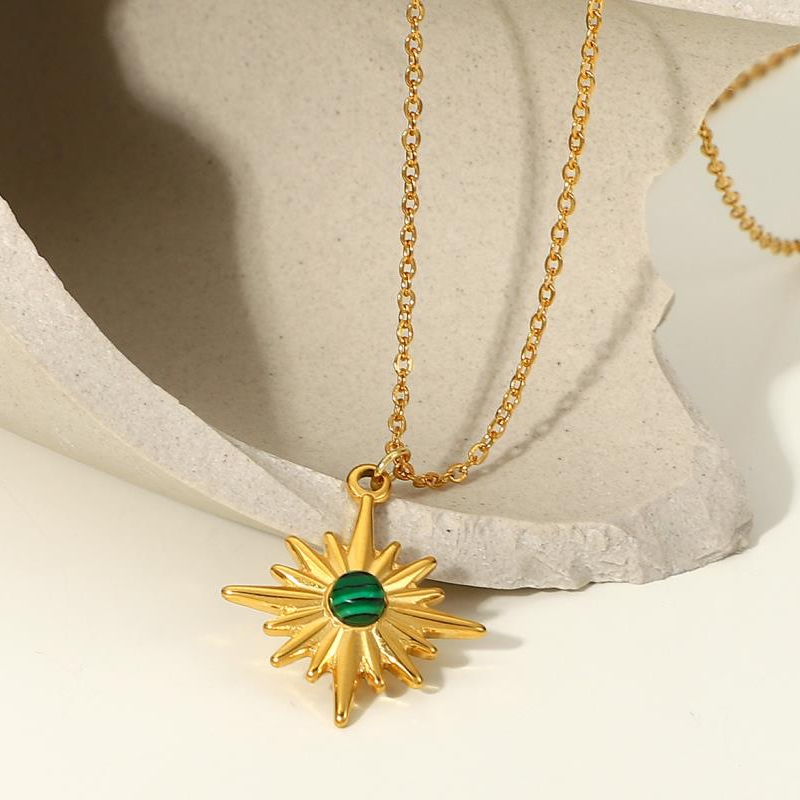 White Leaf gold starburst necklace with green stone