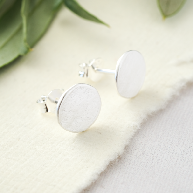 matte silver flat round studs