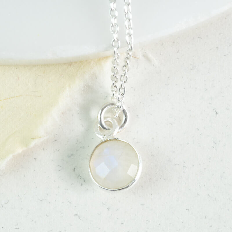 round moonstone pendant on silver chain