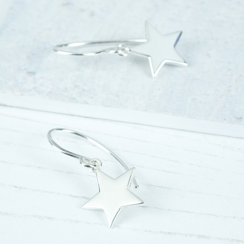 silver star drop earrings