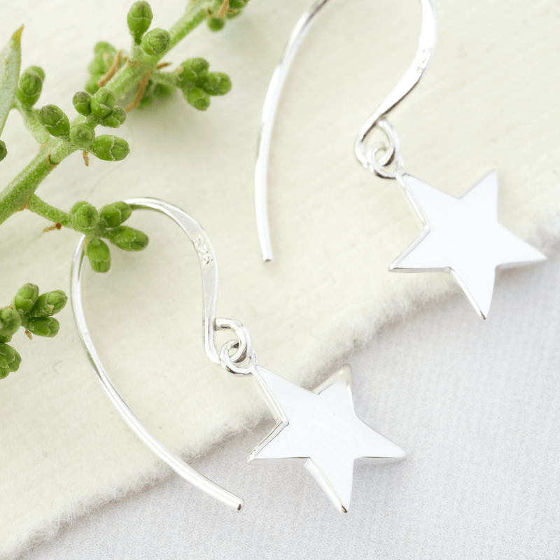 silver star drop earrings