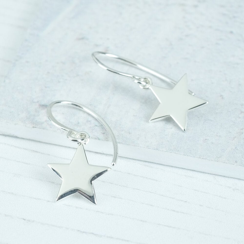 star earrings on a hook